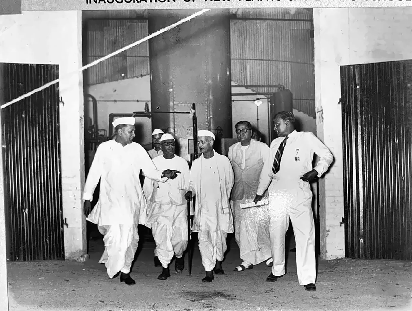 Lal Bahadur Shastri, then Union Minister for Railways and Transport and later Prime Minister of India, with Kanhiya Lal Garg and other ministers inspecting the new plant of The Industrial Gases Limited at Kanpur, 5 August 1956